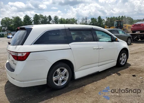 2012 Honda Odyssey Touring z USA, uszkodzony, nr VIN 5FNRL5H9XCB031860